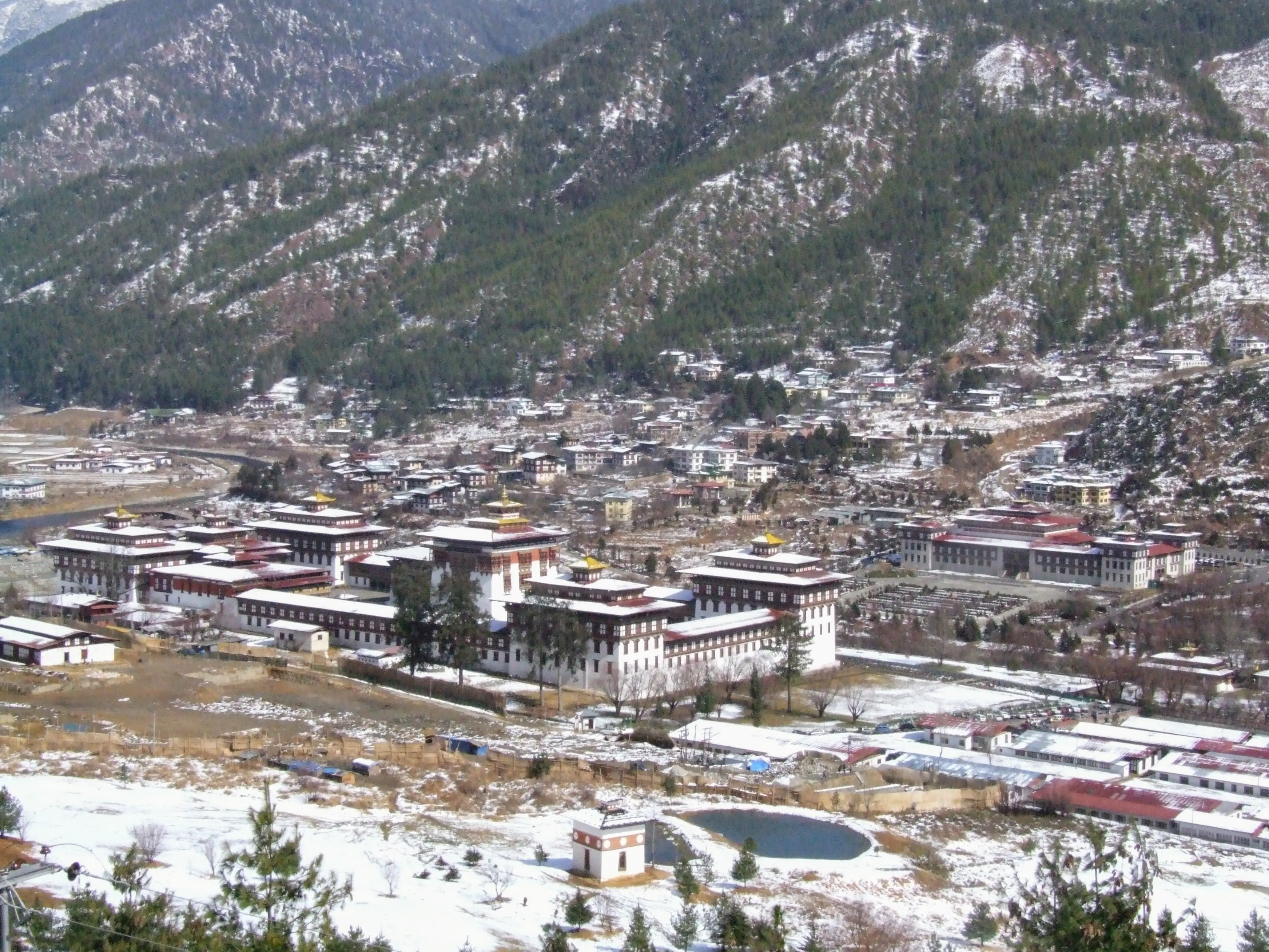 Snow dusting the rooftops and hills of the Thimphu valley in winter